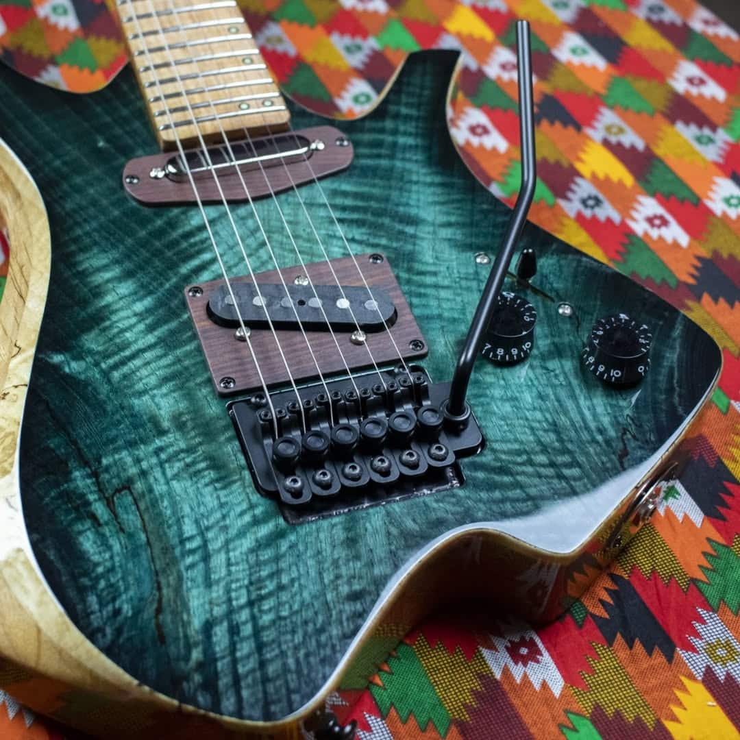 Headless guitar tremolo bridge